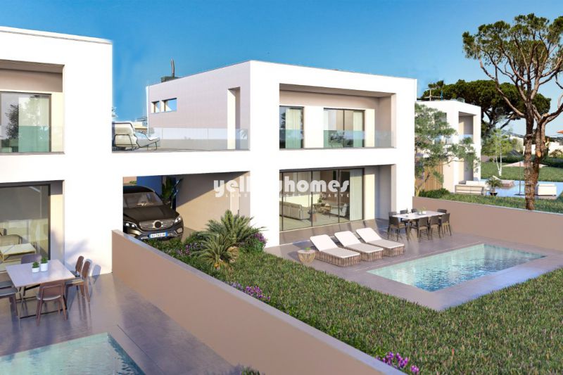 Moradias modernas V4 com jardim privado e piscina perto de Vilamoura/Vila Sol